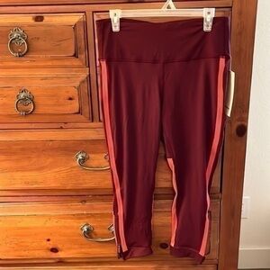 NWT Lululemon Women’s maroon and coral cropped leggings, size 12.
